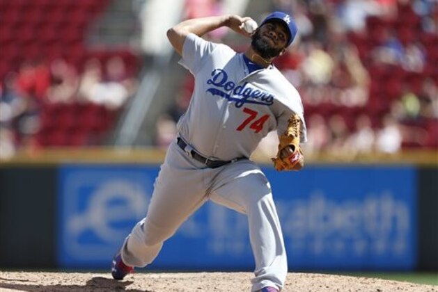 Los Angeles Dodgers relief pitcher Kenley Jansen (74) throws against the Cincinnati Reds during the ninth inning of a baseball game, Sunday, Aug. 21, 2016, in Cincinnati. (AP Photo/Gary Landers)