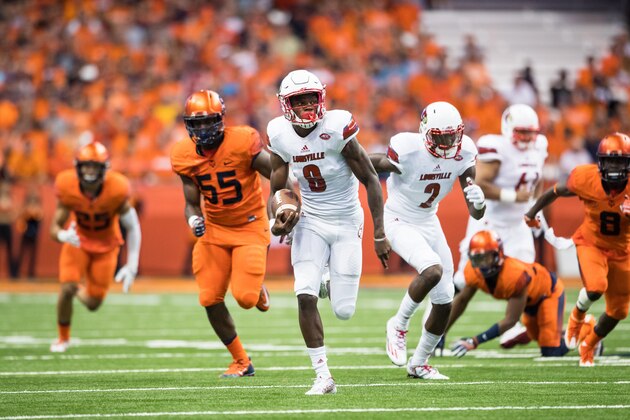 SYRACUSE, NY - SEPTEMBER 09: Lamar Jackson #8 of the Louisville Cardinals carries the ball for a touchdown during the first half against the Syracuse Orange on September 9, 2016 at The Carrier Dome in Syracuse, New York. (Photo by Brett Carlsen/Getty Images) SYRACUSE, NY - SEPTEMBER 09: Lamar Jackson #8 of the Louisville Cardinals carries the ball for a touchdown during the first half against the Syracuse Orange on September 9, 2016 at The Carrier Dome in Syracuse, New York. (Photo by Brett Carlsen/Getty Images)