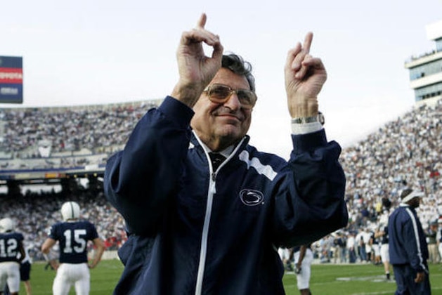 FILE - In this Nov. 5, 2005, file photo, Penn State football coach Joe Paterno acknowledges the crowd during warm-ups before an NCAA college football game against Wisconsin in State College, Pa. As Penn State's athletic department finalizes details for how to honor the 50th anniversary of Joe Paterno’s first win, hundreds of the late coach’s former players were on their way to town to attend a private reunion planned for Friday at the school’s baseball stadium. (AP Photo/Carolyn Kaster, File)