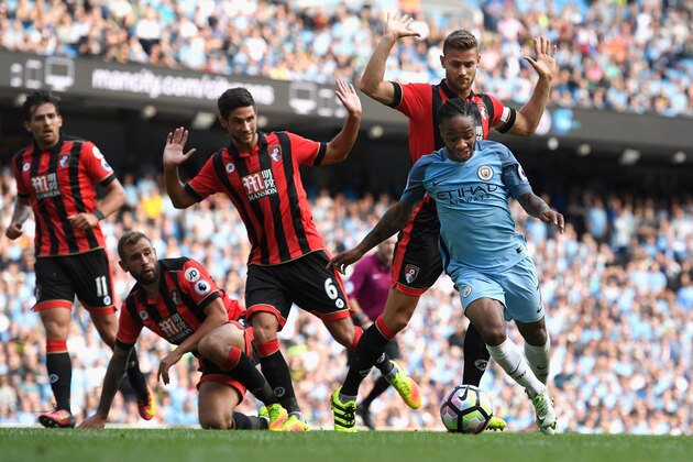 MANCHESTER, ENGLAND - SEPTEMBER 17:  Raheem Sterling of Manchester City burst through the AFC Bournemouth defence during the Premier League match between Manchester City and AFC Bournemouth at Etihad Stadium on September 17, 2016 in Manchester, England.  (Photo by Stu Forster/Getty Images)