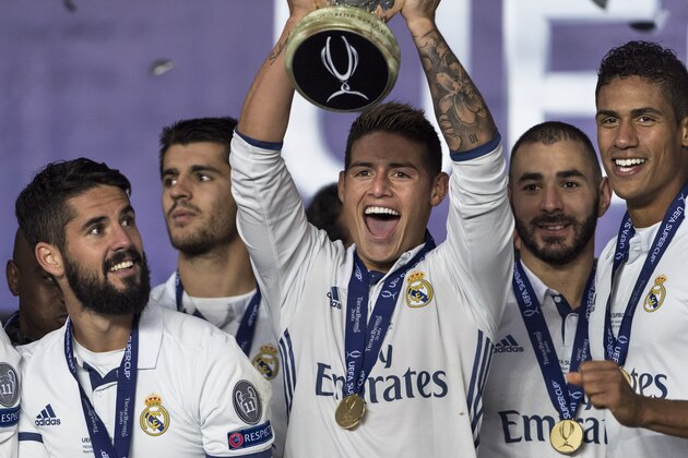 TRONDHEIM, NORWAY - AUGUST 09: Real Madrid players James Rodriguez, Isco, Alvaro Morata, Karim Benzema, Raphael Varane celebrate with team mates and the trophy after theUEFA Super Cup match between Real Madrid and Sevilla at the Lerkendal Stadion on August 9, 2016 in Trondheim, Norway. (Photo by Trond Tandberg/Getty Images)