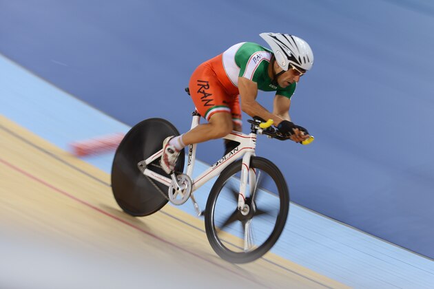 LONDON, ENGLAND - AUGUST 31:  Bahman Golbarnezhad of Iran of Cuba competes in Men's Individual C4-5 1km Cycling Time Trial final on day 2 of the London 2012 Paralympic Games at Velodrome on August 31, 2012 in London, England.  (Photo by Gareth Copley/Getty Images)