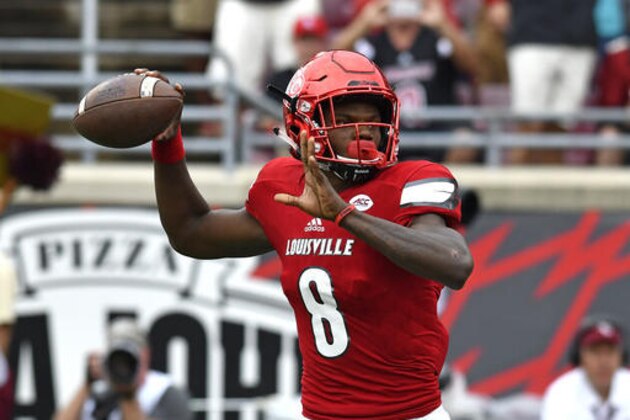 Louisville quarterback Lamar Jackson looks for a receiver during the first quarter of an NCAA college football game against Florida State, Saturday, Sep. 17, 2016 in Louisville Ky. (AP Photo/Timothy D. Easley)