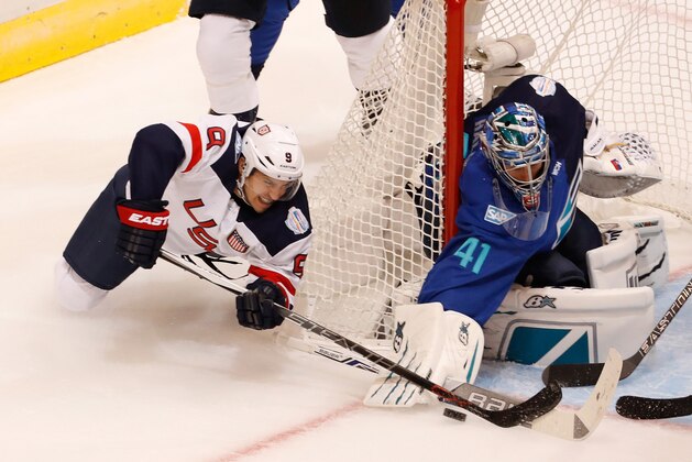 TORONTO, ON - SEPTEMBER 17:  Zach Parise #9 of Team USA looks to get a shot off on Jaroslav Halak #41 of Team Europe during the second period during the World Cup of Hockey tournament on September 17, 2016 in Toronto, Canada.  (Photo by Gregory Shamus/Getty Images)