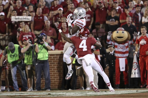 Sep 17, 2016; Norman, OK, USA; Ohio State Buckeyes wide receiver Noah Brown (80) catches a touchdown pass against Oklahoma Sooners cornerback Parrish Cobb (4) during the first half at Gaylord Family - Oklahoma Memorial Stadium. Mandatory Credit: Kevin Jairaj-USA TODAY Sports