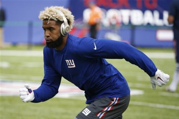 New York Giants wide receiver Odell Beckham warms up before a preseason NFL football game against the New England Patriots Thursday, Sept. 1, 2016, in East Rutherford.  (AP Photo/Kathy Willens)