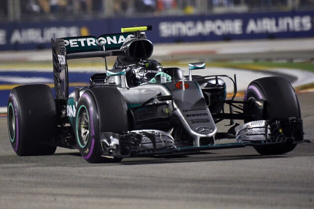 Mercedes AMG Petronas F1 Team's German driver Nico Rosberg drives during the Formula One Singapore Grand Prix in Singapore on September 18, 2016. / AFP / ROSLAN RAHMAN        (Photo credit should read ROSLAN RAHMAN/AFP/Getty Images)