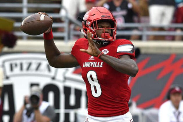 Louisville quarterback Lamar Jackson looks for a receiver during the first quarter of an NCAA college football game against Florida State, Saturday, Sep. 17, 2016 in Louisville Ky. (AP Photo/Timothy D. Easley)