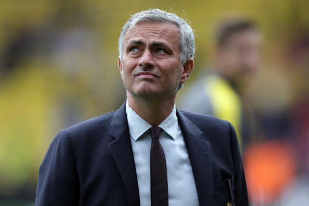 Manchester United manager Jose Mourinho looks across the pitch before the English Premier League soccer match between Watford and Manchester United at Vicarage Road in London, Sunday Sept. 18, 2016. (AP Photo/Tim Ireland)