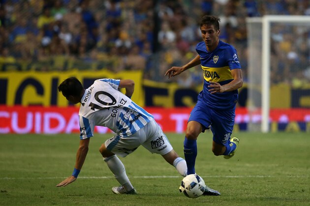 BUENOS AIRES, ARGENTINA - FEBRUARY 14: Rodrigo Bentancur of Boca Juniors in action with Leandro Gonzalez of Atletico Tucuman during the Argentine Primera Division match between Boca Juniors and Atletico Tucuman at the Alberto J Armando Stadium on February 14, 2016 in Buenos Aires, Argentina. (Photo by Chris Brunskill Ltd/Getty Images) *** Local caption *** Rodrigo Bentancur; Leandro Gonzalez