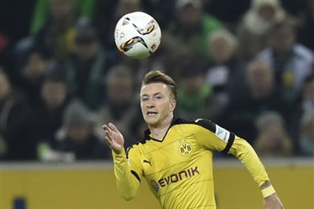 Dortmund's Marco Reus runs for the ball during the German Bundesliga soccer match between Borussia Moenchengladbach and Borussia Dortmund in Moenchengladbach, Germany, Saturday, Jan. 23, 2016. (AP Photo/Martin Meissner)