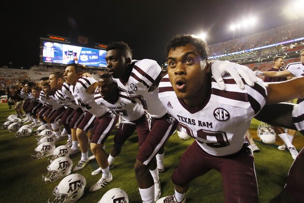 Sep 17, 2016; Auburn, AL, USA;  Texas A&M Aggies players sing their alma mater after the game against the Auburn Tigers at Jordan Hare Stadium.   The Aggies beat the Tigers 29-16.  Mandatory Credit: John Reed-USA TODAY Sports