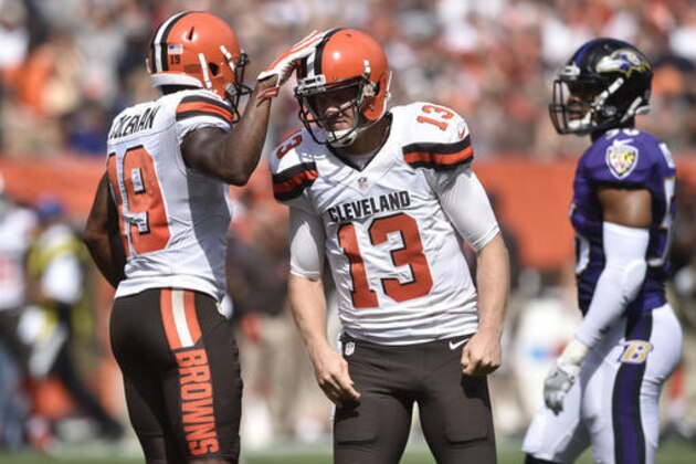 Cleveland Browns quarterback Josh McCown (13) celebrates after throwing a touchdown pass to wide receiver Corey Coleman (19) in the first half of an NFL football game against the Baltimore Ravens, Sunday, Sept. 18, 2016, in Cleveland. (AP Photo/David Richard)