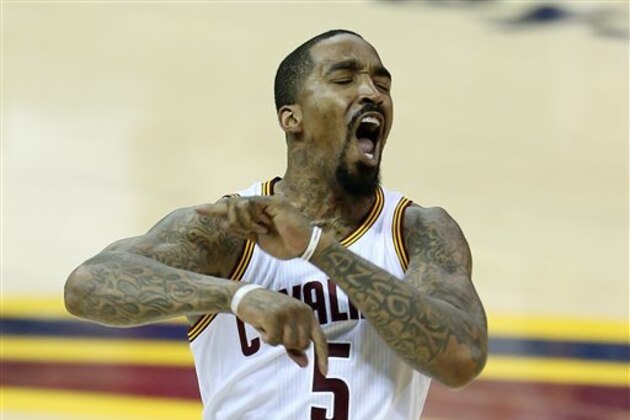 Cleveland Cavaliers guard J.R. Smith (5) celebrates a basket against the Golden State Warriors during the second half of Game 6 of basketball's NBA Finals in Cleveland, Thursday, June 16, 2016. (AP Photo/Ron Schwane)