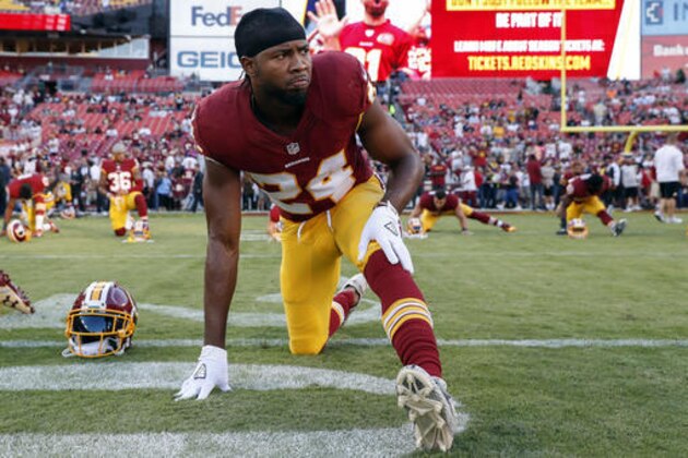 FILE - In this Monday, Sept. 12, 2016, file photo, Washington Redskins cornerback Josh Norman (24) warms up before an NFL football game against the Pittsburgh Steelers in Landover, Md. Will $75 million Redskins CB Josh Norman be assigned to cover the Cowboys' Dez Bryant on Sunday? (AP Photo/Alex Brandon, File)