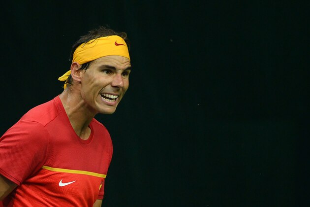 Spain's Rafael Nadal celebrates a point during his doubles tennis match with teammate Feliciano Lopez against India's Leander Peas and Saketh Myneni at the Davis Cup World Group tennis playoffs between Spain and India in New Delhi on September 17, 2016. / AFP / SAJJAD HUSSAIN        (Photo credit should read SAJJAD HUSSAIN/AFP/Getty Images)