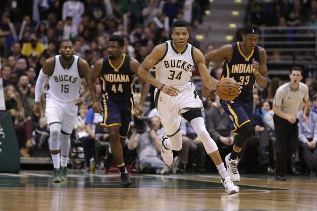 MILWAUKEE, WI - APRIL 13: Giannis Antetokounmpo #34 of the Milwaukee Bucks dribbles the basketball up the court on a fast break during the second quarter against the Indiana Pacers at BMO Harris Bradley Center on April 13, 2016 in Milwaukee, Wisconsin. NOTE TO USER: User expressly acknowledges and agrees that, by downloading and or using this photograph, User is consenting to the terms and conditions of the Getty Images License Agreement. (Photo by Mike McGinnis/Getty Images)