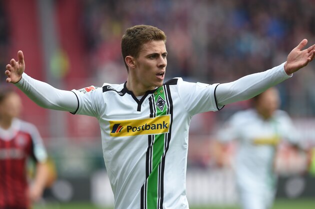 Moenchengladbach's Belgian midfielder Thorgan Hazard reacts during the German first division Bundesliga football match between FC Ingolstadt 04 and Borussia Moenchengladbach in Ingolstadt, southern Germany, on April 9, 2016. / AFP / CHRISTOF STACHE / RESTRICTIONS: DURING MATCH TIME: DFL RULES TO LIMIT THE ONLINE USAGE TO 15 PICTURES PER MATCH AND FORBID IMAGE SEQUENCES TO SIMULATE VIDEO. == RESTRICTED TO EDITORIAL USE == FOR FURTHER QUERIES PLEASE CONTACT DFL DIRECTLY AT + 49 69 650050
        (Photo credit should read CHRISTOF STACHE/AFP/Getty Images)