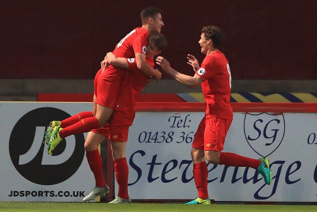 STEVENAGE, ENGLAND - SEPTEMBER 19:  Cameron Brannagan of Liverpool is congratulated on his goal during the Premier League 2 match between Tottenham Hotspur and Liverpool at The Lamex Stadium on September 19, 2016 in Stevenage, England.  (Photo by Matthew Lewis/Getty Images)
