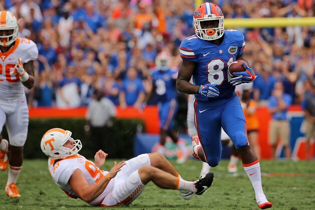 GAINESVILLE, FL - SEPTEMBER 26: Antonio Callaway #81 of the Florida Gators makes a catch over Danny O'Brien #95 of the Tennessee Volunteers during a game  at Ben Hill Griffin Stadium on September 26, 2015 in Gainesville, Florida.  (Photo by Mike Ehrmann/Getty Images)