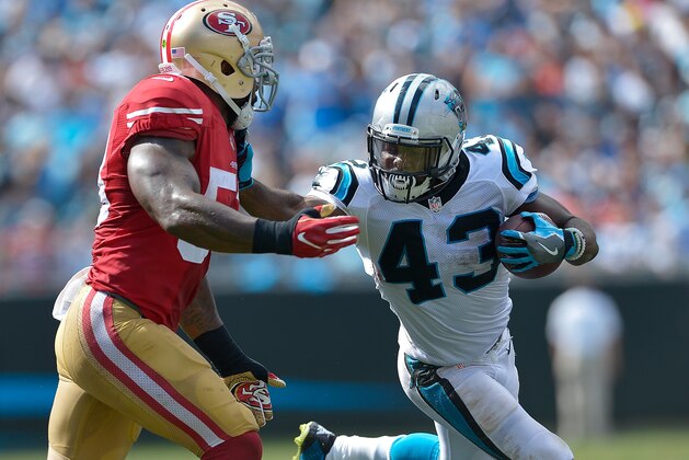 CHARLOTTE, NC - SEPTEMBER 18:  Fozzy Whittaker #43 of the Carolina Panthers runs against NaVorro Bowman #53 of the San Francisco 49ers during the game at Bank of America Stadium on September 18, 2016 in Charlotte, North Carolina.  (Photo by Grant Halverson/Getty Images)