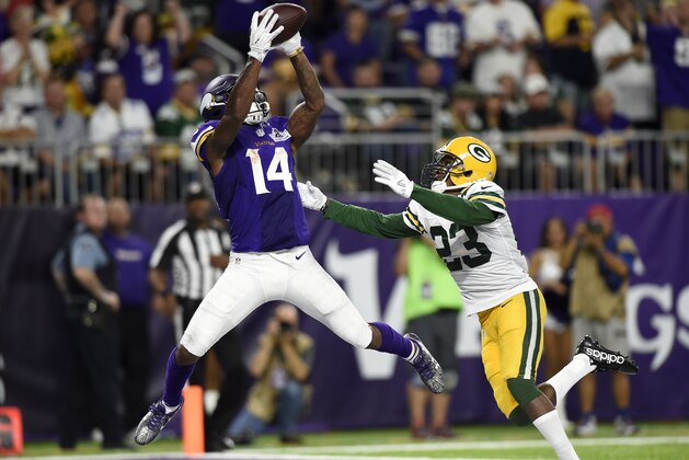 MINNEAPOLIS, MN - SEPTEMBER 18: Stefon Diggs #14 of the Minnesota Vikings makes a leaping catch for a touchdown over defender Damarious Randall #23 of the Green Bay Packers in the third quarter of the game on September 18, 2016 at US Bank Stadium in Minneapolis, Minnesota. (Photo by Hannah Foslien/Getty Images)