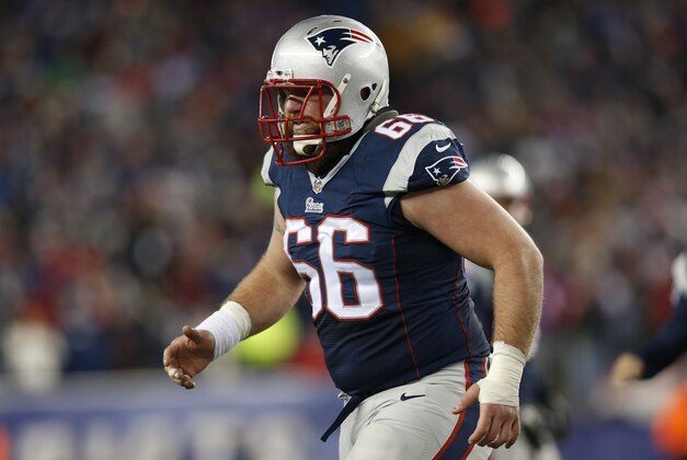 Jan 10, 2015; Foxborough, MA, USA; New England Patriots center Bryan Stork (66) walks off the field after being injured during the second quarter in the 2014 AFC Divisional playoff football game against the Baltimore Ravens at Gillette Stadium. Mandatory Credit: Greg M. Cooper-USA TODAY Sports