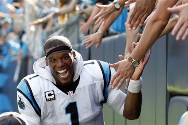 Carolina Panthers' Cam Newton (1) celebrates with fans after an NFL football game against the San Francisco 49ers in Charlotte, N.C., Sunday, Sept. 18, 2016. The Panthers won 46-27. (AP Photo/Bob Leverone)