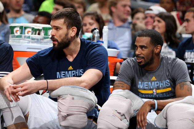 MEMPHIS, TN - JANUARY 30:  Marc Gasol #33 and Mike Conley #11 of the Memphis Grizzlies ice their knees from the bench during the game against the Sacramento Kings on January 30, 2016 at FedExForum in Memphis, Tennessee. NOTE TO USER: User expressly acknowledges and agrees that, by downloading and or using this photograph, User is consenting to the terms and conditions of the Getty Images License Agreement. Mandatory Copyright Notice: Copyright 2016 NBAE (Photo by Joe Murphy/NBAE via Getty Images)