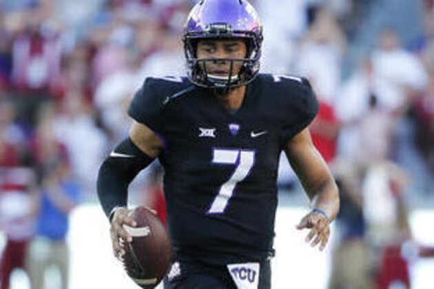 TCU quarterback Kenny Hill (7) finds running room against Arkansas in the first half of an NCAA college football game, Saturday, Sept. 10, 2016, in Fort Worth, Texas. (AP Photo/Tony Gutierrez)