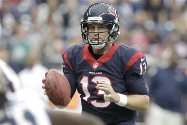 Houston Texans quarterback T.J. Yates looks to pass during the third quarter of an NFL football game Sunday, Oct. 13, 2013, in Houston, Texas. (AP Photo/Patric Schneider)