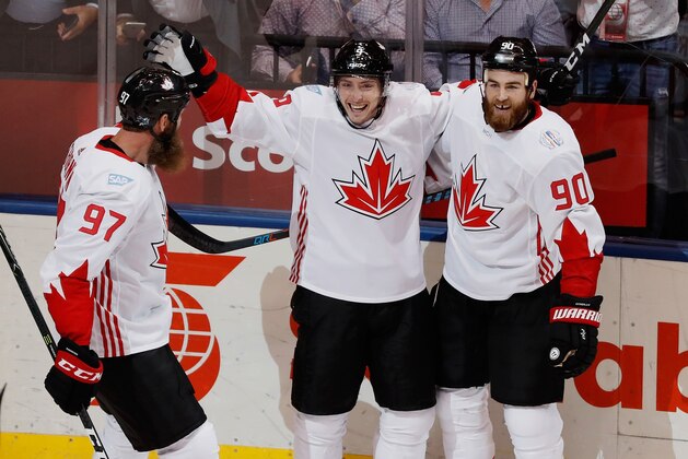 TORONTO, ON - SEPTEMBER 20: Matt Duchene #9 of Team Canada celebrates his first period goal with Ryan O'Reilly #90 and Joe Thornton #97 while playing Team USA during the World Cup of Hockey at the Air Canada Center on September 20, 2016 in Toronto, Canada.  (Photo by Gregory Shamus/Getty Images)
