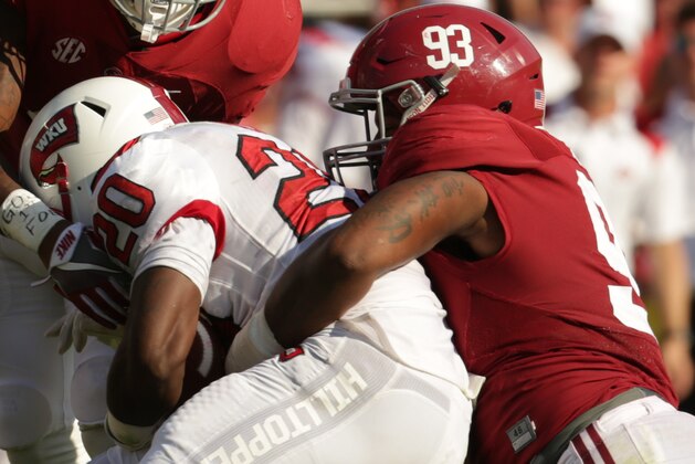 Sep 10, 2016; Tuscaloosa, AL, USA;  Western Kentucky Hilltoppers running back Anthony Wales (20) is grabbed from behind by Alabama Crimson Tide defensive lineman Jonathan Allen (93) and defensive back Eddie Jackson (4) at Bryant-Denny Stadium. The Tide defeated the Hilltoppers 38-10. Mandatory Credit: Marvin Gentry-USA TODAY Sports