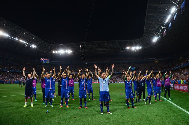 NICE, FRANCE - JUNE 27:  Iceland players celebrate their team's 2-1 win in the UEFA EURO 2016 round of 16 match between England and Iceland at Allianz Riviera Stadium on June 27, 2016 in Nice, France.  (Photo by Dan Mullan/Getty Images)