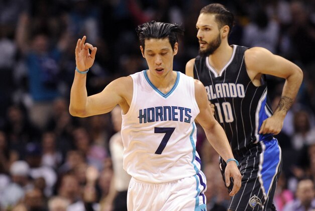 Apr 13, 2016; Charlotte, NC, USA; Charlotte Hornets guard Jeremy Lin (7) celebrates after scoring during the first half of the game against the Orlando Magic at Time Warner Cable Arena. Mandatory Credit: Sam Sharpe-USA TODAY Sports