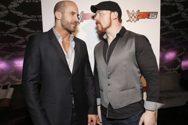 IMAGE DISTRIBUTED FOR 2K - WWE Superstars Cesaro and Sheamus engage in a friendly stare down at the SummerSlam Confidential Panel for the WWE 2K15 roster reveal at Club Nokia, on Saturday, August 16, 2014 in Los Angeles. (Photo by Todd Williamson/Invision for 2K/AP Images)
