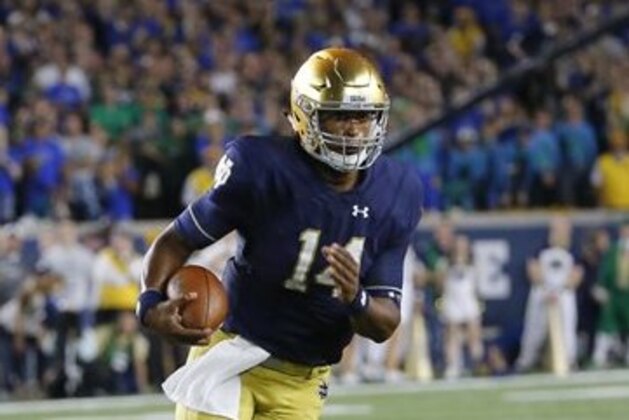 Notre Dame quarterback DeShone Kizer (14) scrambles during the first half of an NCAA college football game against Michigan State Saturday, Sept. 17, 2016, in South Bend, Ind. (AP Photo/Charles Rex Arbogast)