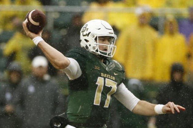 FILE - In this Oct. 24, 2015, file photo, Baylor's Seth Russell throws a pass in the first half of an NCAA college football game against Iowa State in Waco, Texas. If Russell stays healthy and can repeat what he was doing before getting hurt, the Bears could be near the top of the Big 12 standings.  (AP Photo/Tony Gutierrez, File)