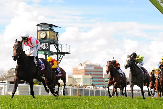 MELBOURNE, AUSTRALIA - SEPTEMBER 17:  Dwayne Dunn riding Exocet winning Race 3 during Melbourne Racing at Caulfield Racecourse on September 17, 2016 in Melbourne, Australia.  (Photo by Vince Caligiuri/Getty Images)