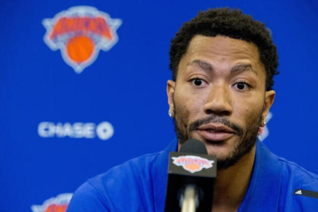 FILE - In this June 24, 2016, file photo, Derrick Rose speaks during a news conference at Madison Square Garden in New York. The woman at the center of a sexual assault case that accuses NBA star Derrick Rose and two others of gang rape is leading two starkly different lives. She has kept a painful secret from her own parents while somehow balancing a dual existence, one as dedicated college student who now even more than ever cherishes her large, traditional Mexican family as she prepares for the reality that her name might soon be made public as the plaintiff in this high-profile civil case. (AP Photo/Mary Altaffer, File)
