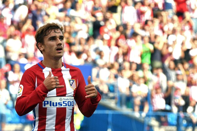 Atletico Madrid's French forward Antoine Griezmann celebrates after scoring during the Spanish league football match Club Atletico de Madrid vs Real Sporting de Gijon at the Vicente Calderon stadium in Madrid on September 17, 2016. / AFP / GERARD JULIEN        (Photo credit should read GERARD JULIEN/AFP/Getty Images)