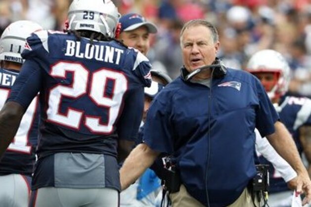 New England Patriots head coach Bill Belichick greets running back LeGarrette Blount after a touchdown during a NFL football game against the Miami Dolphins at Gillette Stadium in Foxborough, Mass. Sunday, Sept. 18, 2016. (Winslow Townson/AP Images for Panini)