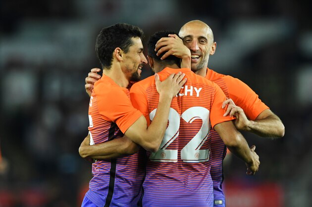 SWANSEA, WALES - SEPTEMBER 21:  Gael Clichy of Manchester City celebrates scoring his sides first goal with team mates during the  EFL Cup Third Round match between Swansea City and Manchester City at the Liberty Stadium on September 21, 2016 in Swansea, Wales.  (Photo by Stu Forster/Getty Images)