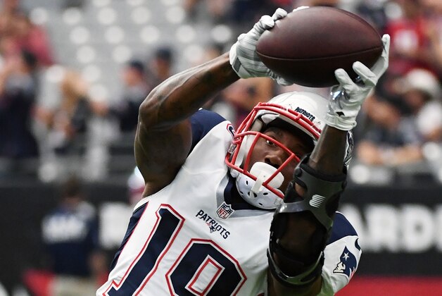 GLENDALE, AZ - SEPTEMBER 11:  Wide receiver Malcolm Mitchell #19 of the New England Patriots catches a pass as he warms up before an NFL game against the Arizona Cardinals at University of Phoenix Stadium on September 11, 2016 in Glendale, Arizona. New England won 23-21.  (Photo by Ethan Miller/Getty Images)