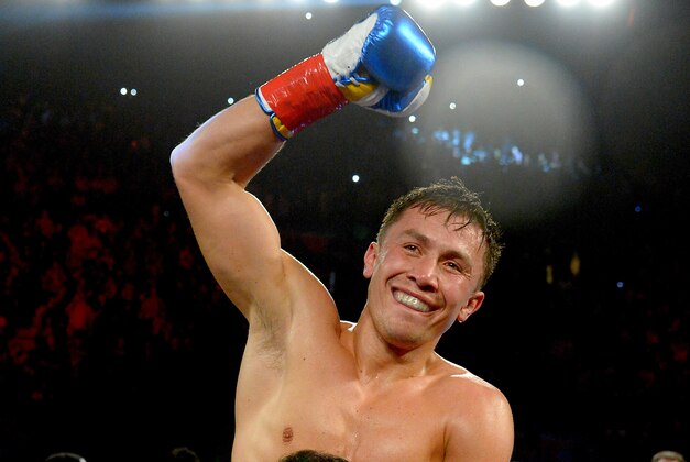 Apr 23, 2016; Los Angeles, CA, USA; Gennady Golovkin  (red tape) celebrates after defeating Dominic Wade  (blue tape) in their Middleweight World Championship fight at The Forum. Golovkin won by TKO in the second round. Mandatory Credit: Jayne Kamin-Oncea-USA TODAY Sports