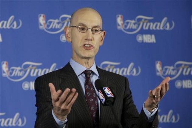 FILE- In this June 2, 2016, file photo, NBA commissioner Adam Silver speaks during a news conference before Game 1 of basketball's NBA Finals between the Golden State Warriors and the Cleveland Cavaliers in Oakland, Calif. NBA owners made no decision Tuesday, July 12, after a lengthy debate about moving next year's All-Star Game from Charlotte because of North Carolina's law limiting protection for LGBT people. (AP Photo/Jeff Chiu, File)