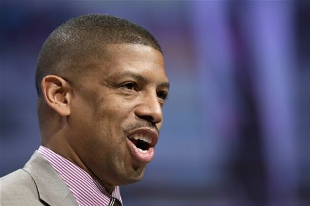 Kevin Johnson, Mayor of Sacramento and President, The United States Conference of Mayors, makes remarks during a luncheon at the opening of the annual meeting of the U.S. Conference of Mayors, Friday, June 20, 2014, in Dallas. (AP Photo/Tony Gutierrez)
