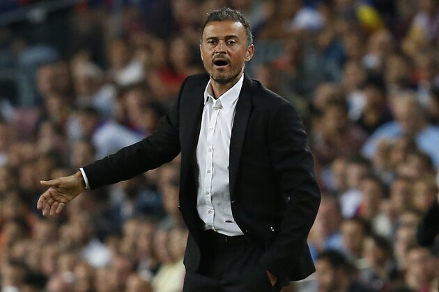 Barcelona's coach Luis Enrique gestures from the sideline during the Spanish league football match FC Barcelona vs Atletico de Madrid at the Camp Nou stadium in Barcelona on September 21, 2016. / AFP / PAU BARRENA        (Photo credit should read PAU BARRENA/AFP/Getty Images)