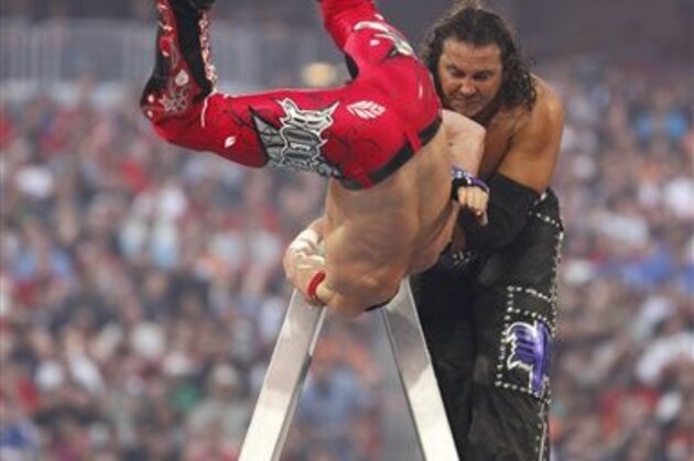 WWE Superstar Matt Hardy sends Evan Bourne to the mat during the Money in the Bank match at WrestleMania XXVI on March 28, 2010, at University of Phoenix Stadium in Glendale, Arizona. (AP Photo/Rick Scuteri)
