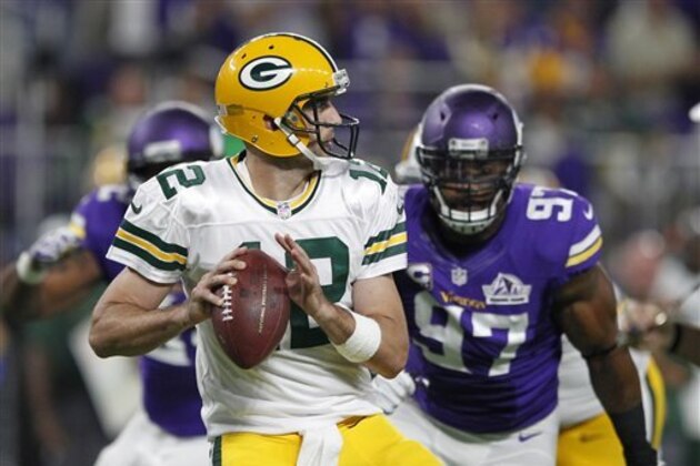 Green Bay Packers quarterback Aaron Rodgers (12) throws a pass during the first half of an NFL football game against the Minnesota Vikings Sunday, Sept. 18, 2016, in Minneapolis. (AP Photo/Andy Clayton-King)